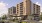 a large building with cars parked in front of it