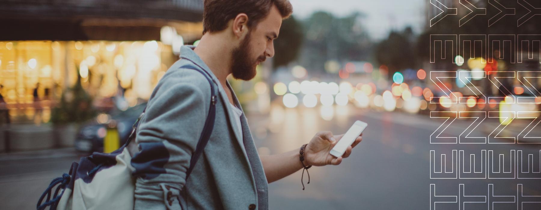 a man looking at a phone