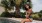 a woman sitting on the pool's edge