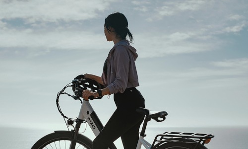 Settle into comfort at Tenney North Park a woman on bicycle